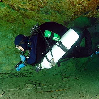 diver in a cave